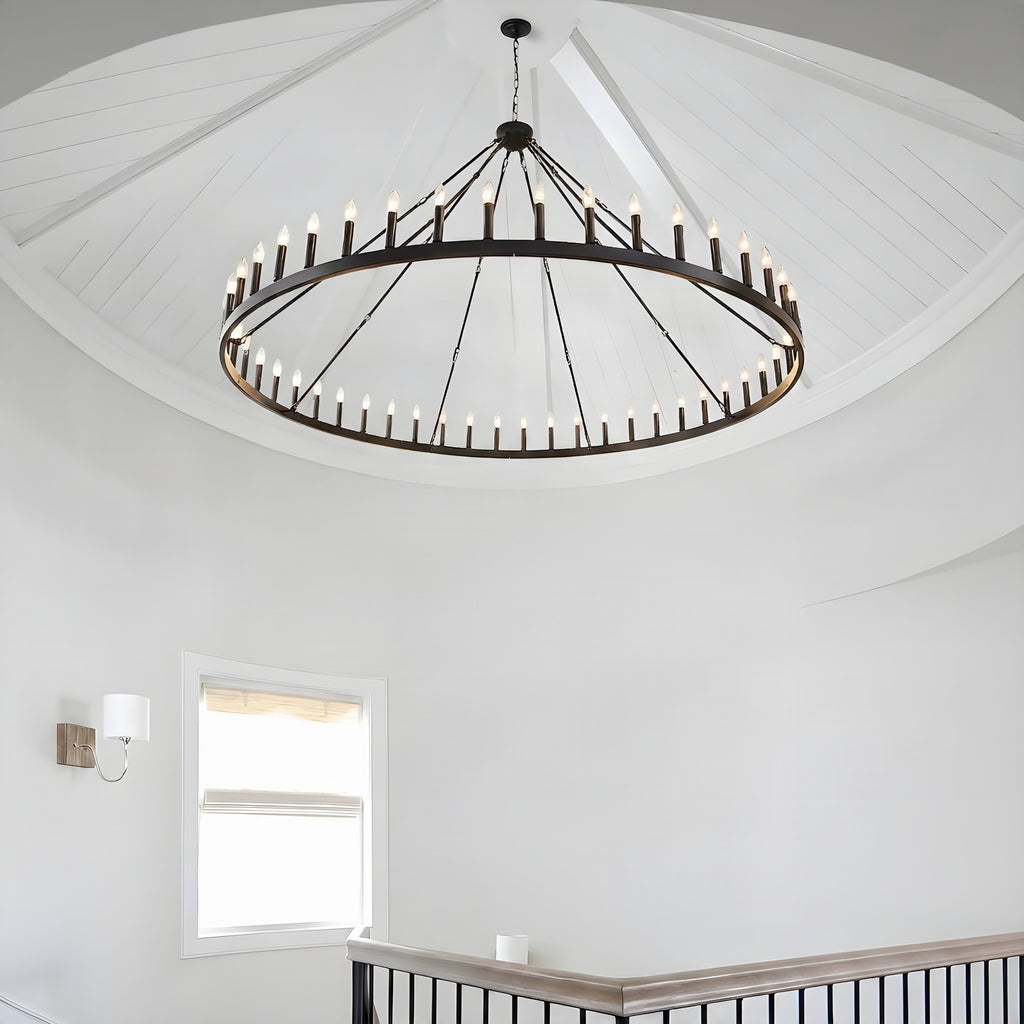 80 inch farmhouse chandelier hung from a vaulted ceiling