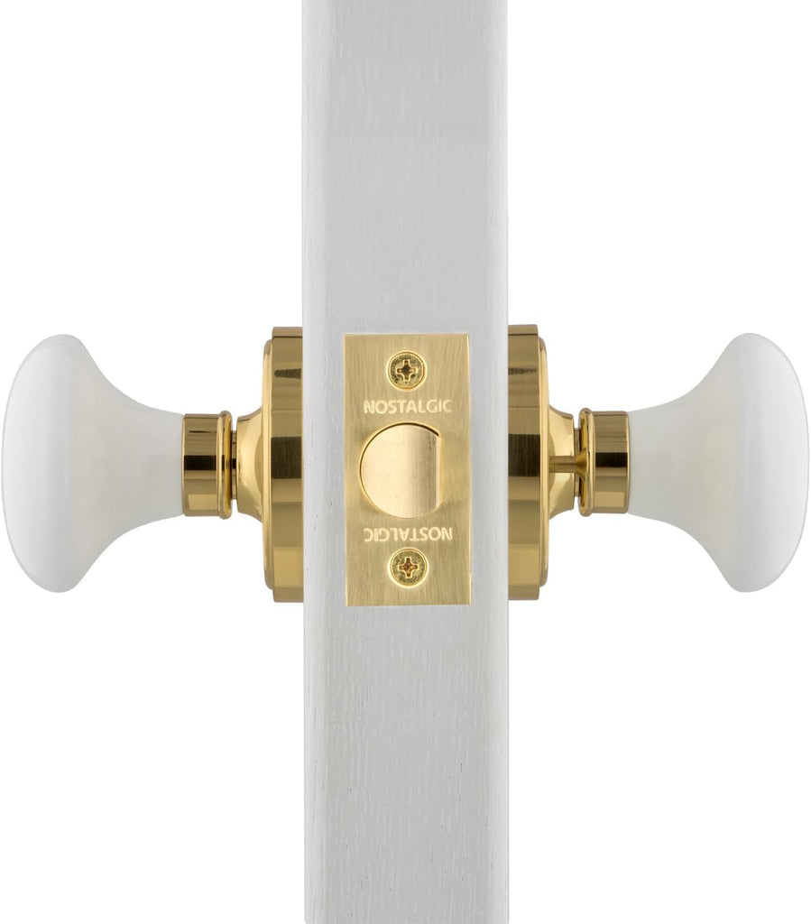 Classic Rosette Privacy White Porcelain Door Knob in Unlacquered Brass