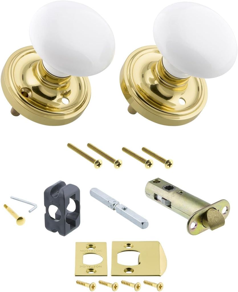 Classic Rosette Privacy White Porcelain Door Knob in Unlacquered Brass