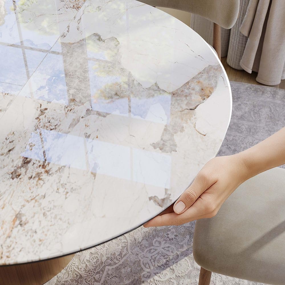 Modern Extendable Dining Table for 4-6, 47" to 63" Round to Oval Sintered Stone Kitchen Table with Carbon Steel Base