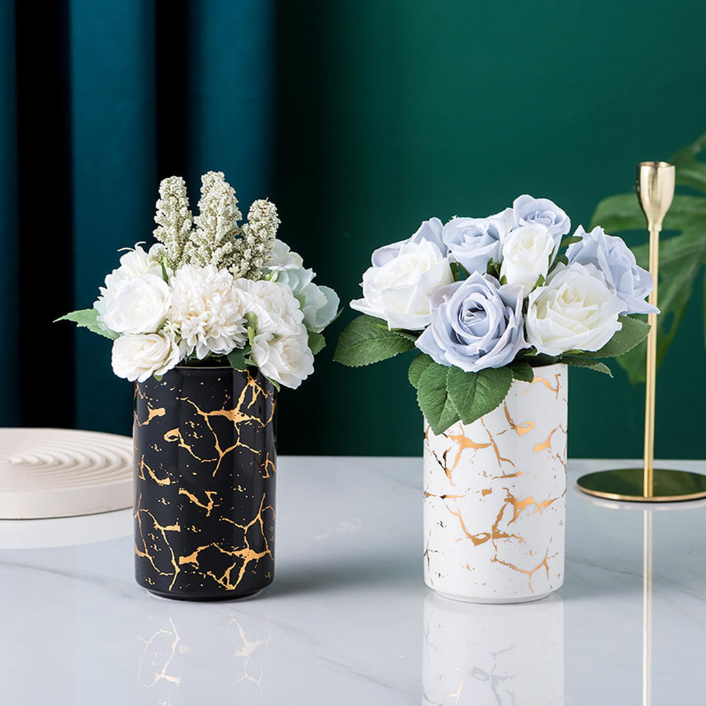 Elegant ceramic food storage jar with golden marble design, black and white, used for organizing kitchen and food