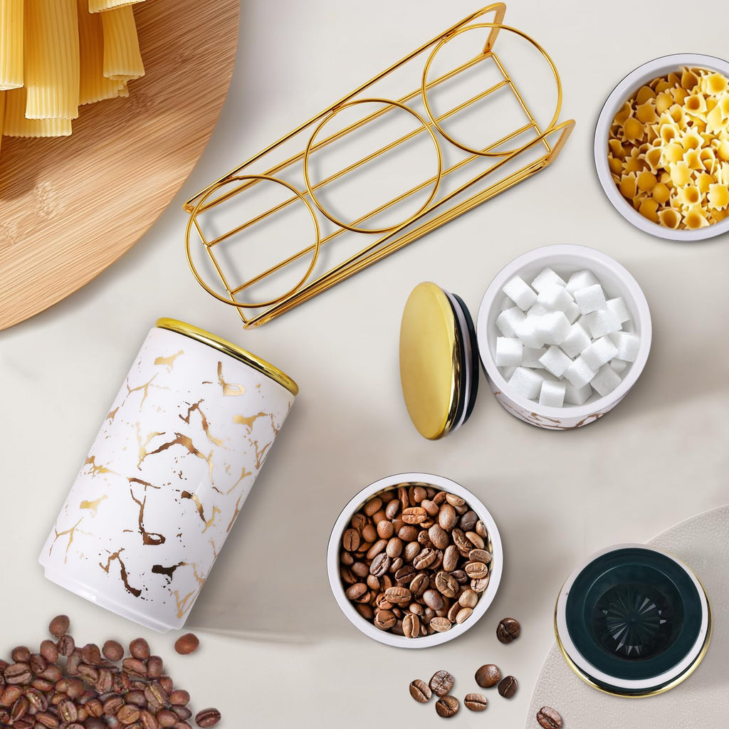 Elegant ceramic food storage jar with golden marble design, black and white, used for organizing kitchen and food
