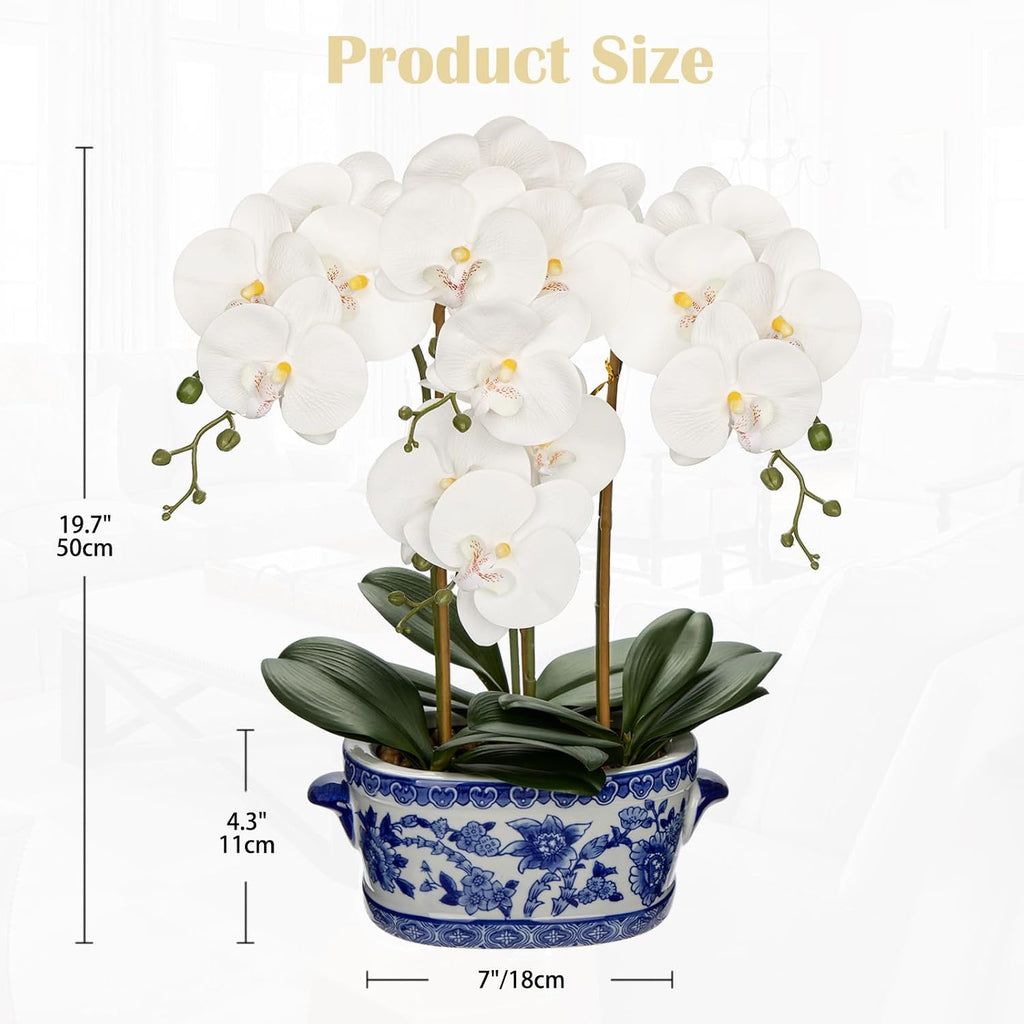 White faux orchid in blue and white porcelain pot