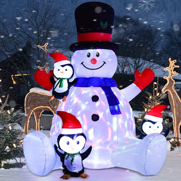 7Ft Lighted Christmas Inflatable Snowman with Three Cute Penguins, Rotating 7 Color Changing Lights Building 3 LED