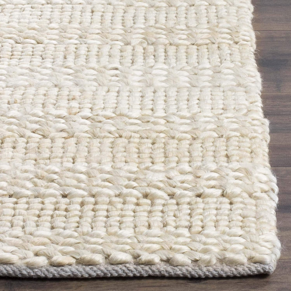 Natural Fiber Area Rug - 9' x 12', Bleach, Handmade Jute, Braided Woven Design