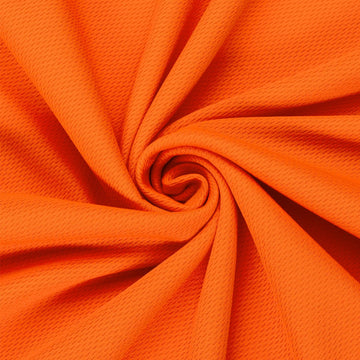 Textiles 4 Yard Bolt Orange Dimple Mesh Athletic Jersey Fabric