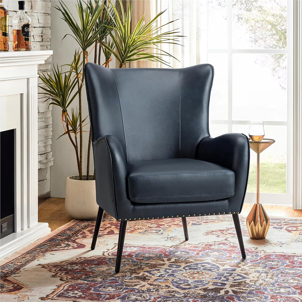Faux Leather Accent Chair, Navy | Wingback design with removable cushion, nailhead trim, and metal legs , reading