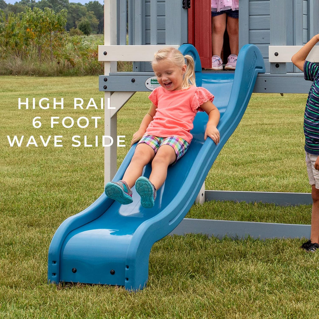 Beacon Heights Elevated Cedar Wooden Kids Playhouse with Wave Slide, Play Kitchen, Wrap-Around Deck, Flat-Step