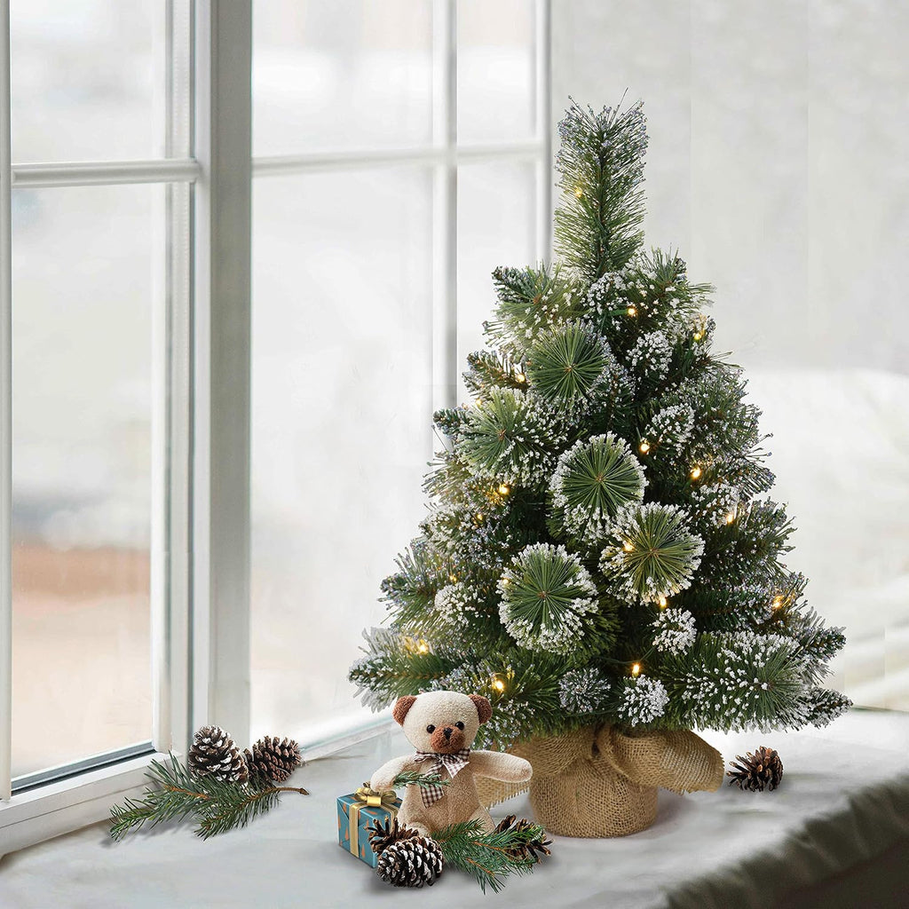 International Pre-Lit 2' Table Top Artificial Christmas Tree with 35 Lights in Tan Sac, Green