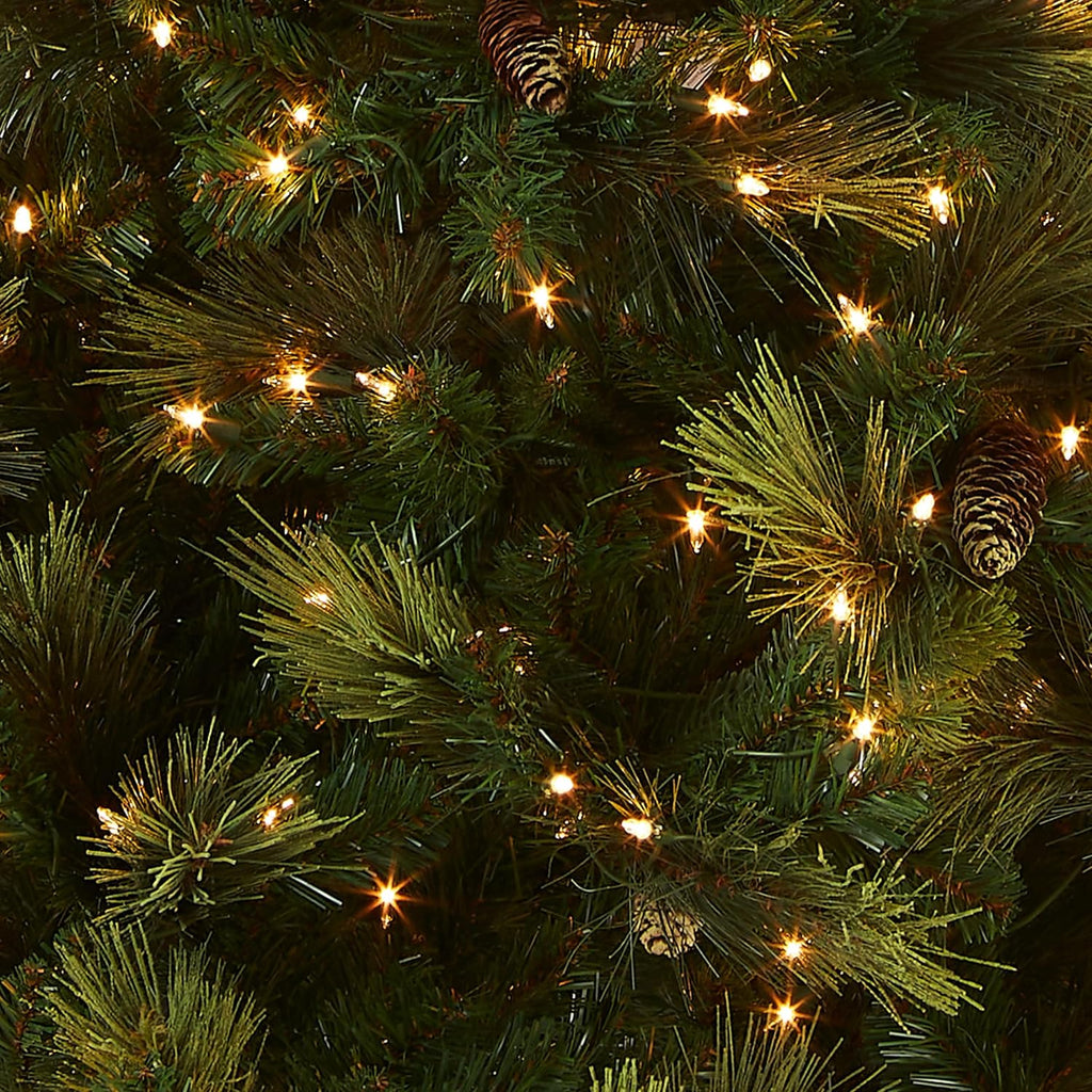 Tree Company 7ft Pre-Lit Carolina Pine Artificial Christmas Tree | 700 Clear Lights, 1,147 Tips, Includes Stand, Green