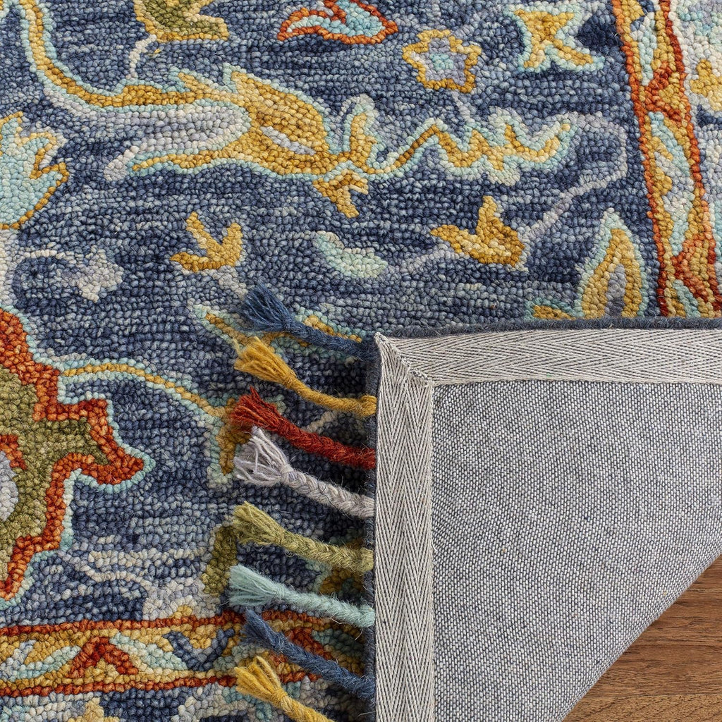 Aspen Area Rug - 9' x 12', Blue & Rust, Handmade Boho Braided Tassel Wool