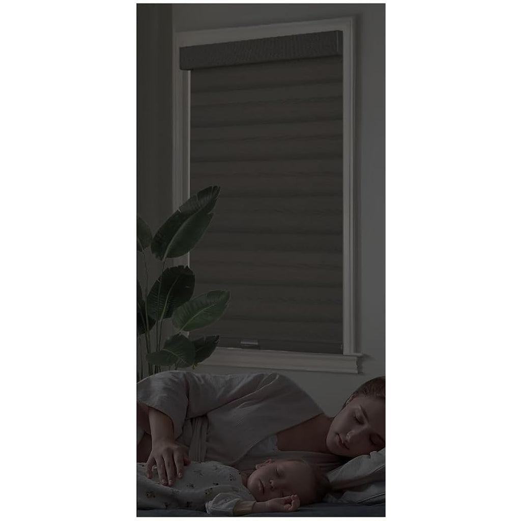 Grey linen zebra blind closed for privacy in a bedroom