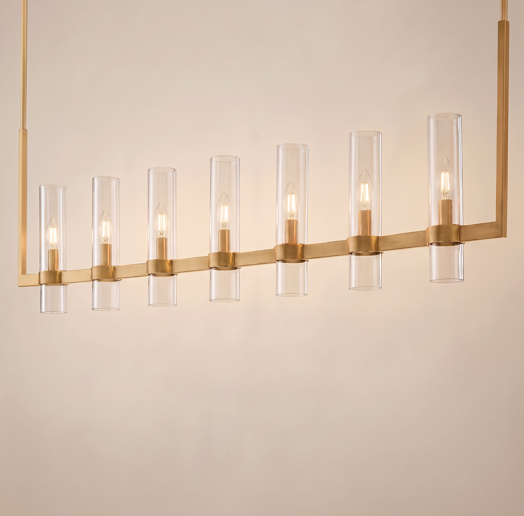 Inspired Ravelle Style 59" linear chandelier, 7 lights, gold brass finish, clear glass cylinders